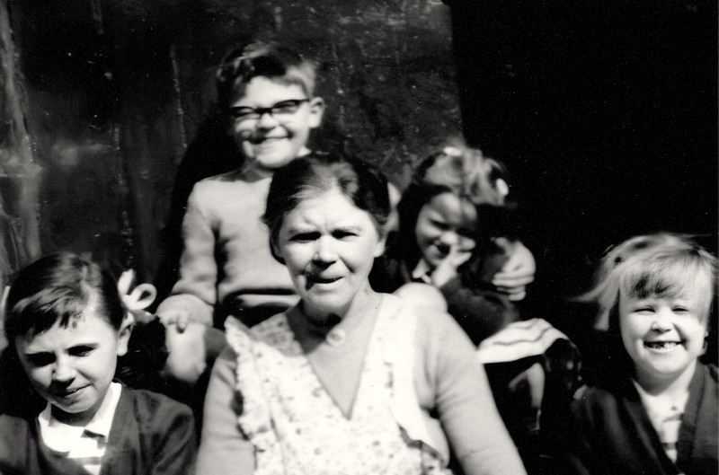 Respondent Mike Kelly And His Three Sisters And Granny Ward On The Doorstep Of 13 Hydepark Street, In 1960. Courtesy Of Mike Kelly image