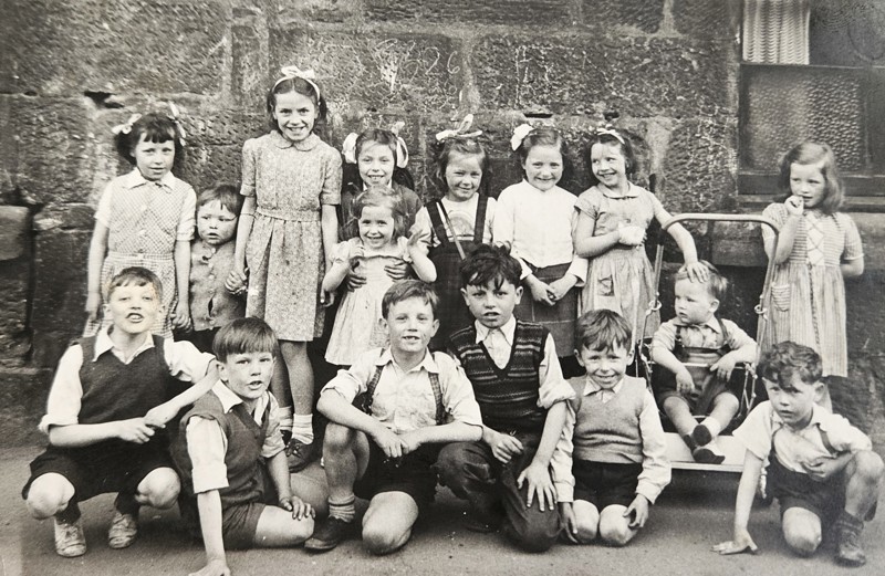 Jean About 6 Years Old, Back Row, 3Rd From Right. Backcourt, Phoenix Park Terrace, Cowcaddens, With Street Pals, 1953. Courtesy Of Respondent Jean Campbell image