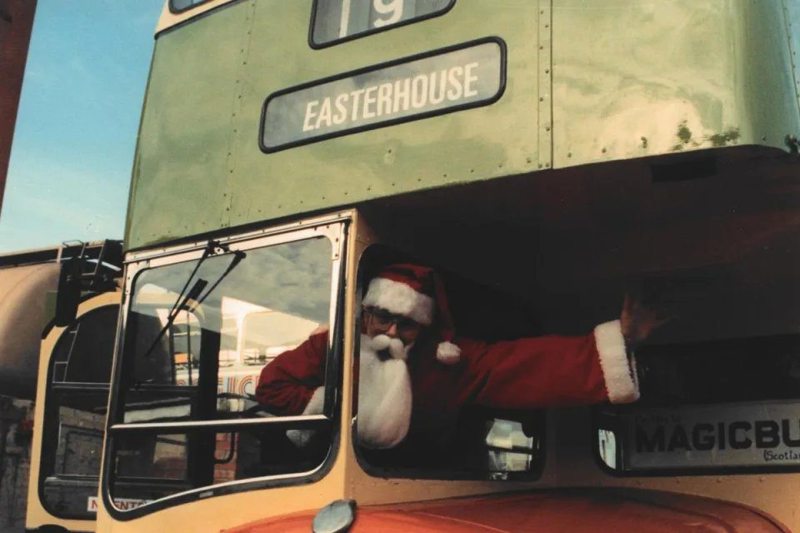 Santa Eschewing His Sleigh For A Vintage Routemaster In Corporation Colours, As He Arrives In Easterhouse In 1988 image