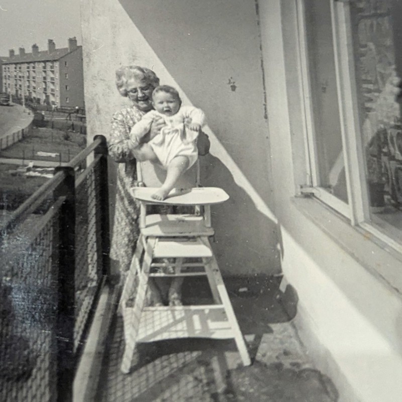 Respondent Raymond Macmillan's Gran With His Wee Brother On The Veranda Of His Home In Kilvaxter Drive, Arden, 1958. Courtesy Of R Macmillan image