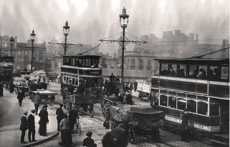 Trams, Horses And Carts, Cyclists And Pedestrians All Making Their Way Over Glasgow Bridge In 1914. image