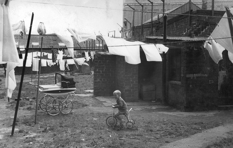 Child Riding His Tricycle In A Back Court In Partick, C.1969. image