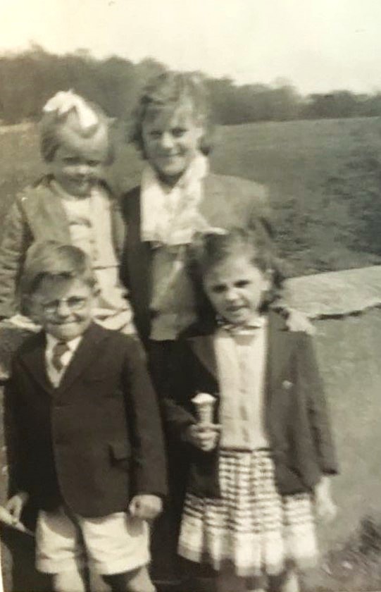 A Day Out At The Bluebell Woods Drumchapel For Mike, Evelyn, And Marion Kelly, With Cousin Rose Elliot. Mike's Jumper Knitted By His Mother. 1959. Courtesy Of Respondent Mike Kelly image